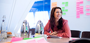 An office worker in a meeting room