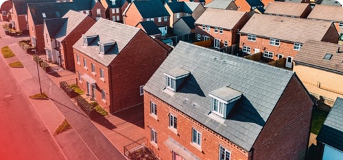 Aerial view of a residential street with modern houses in a suburban neighbourhood